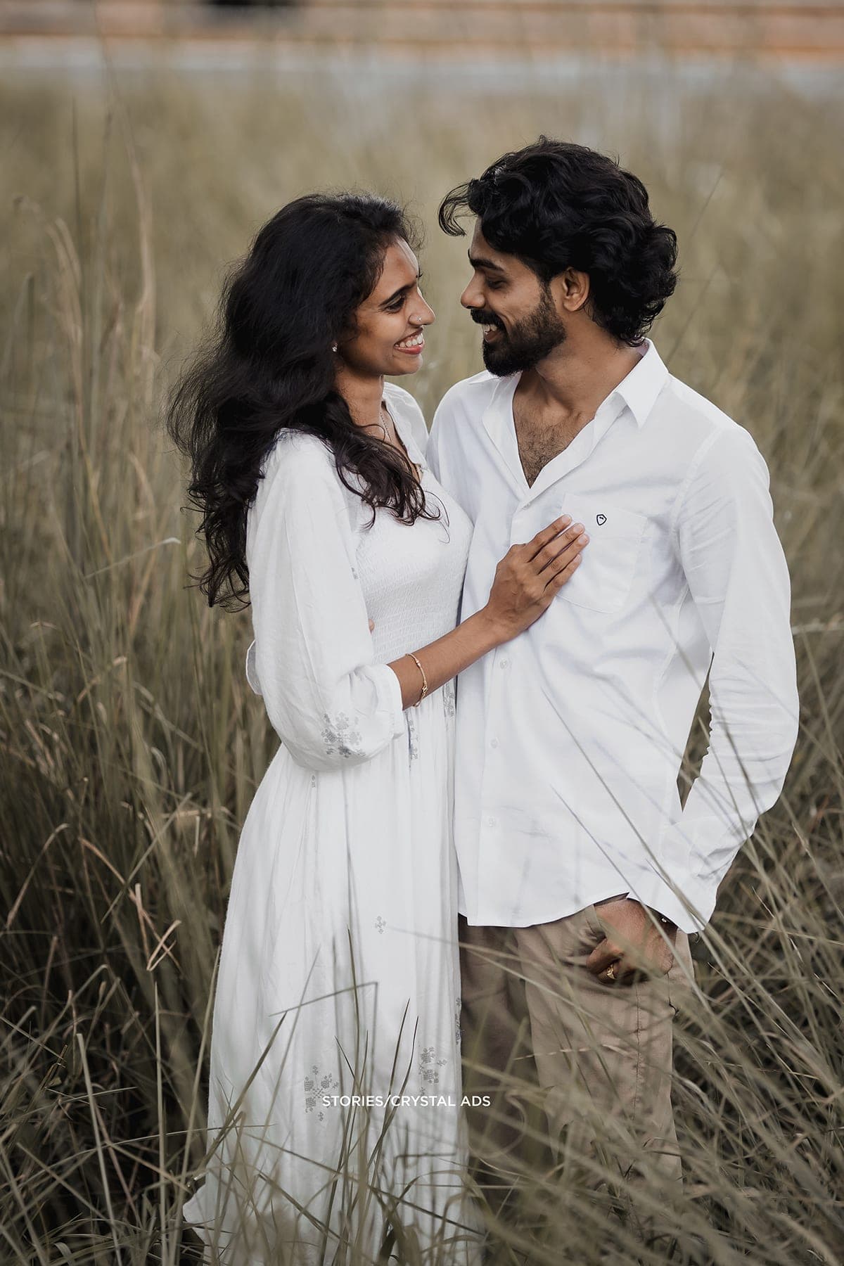Couple standing close and looking at each other