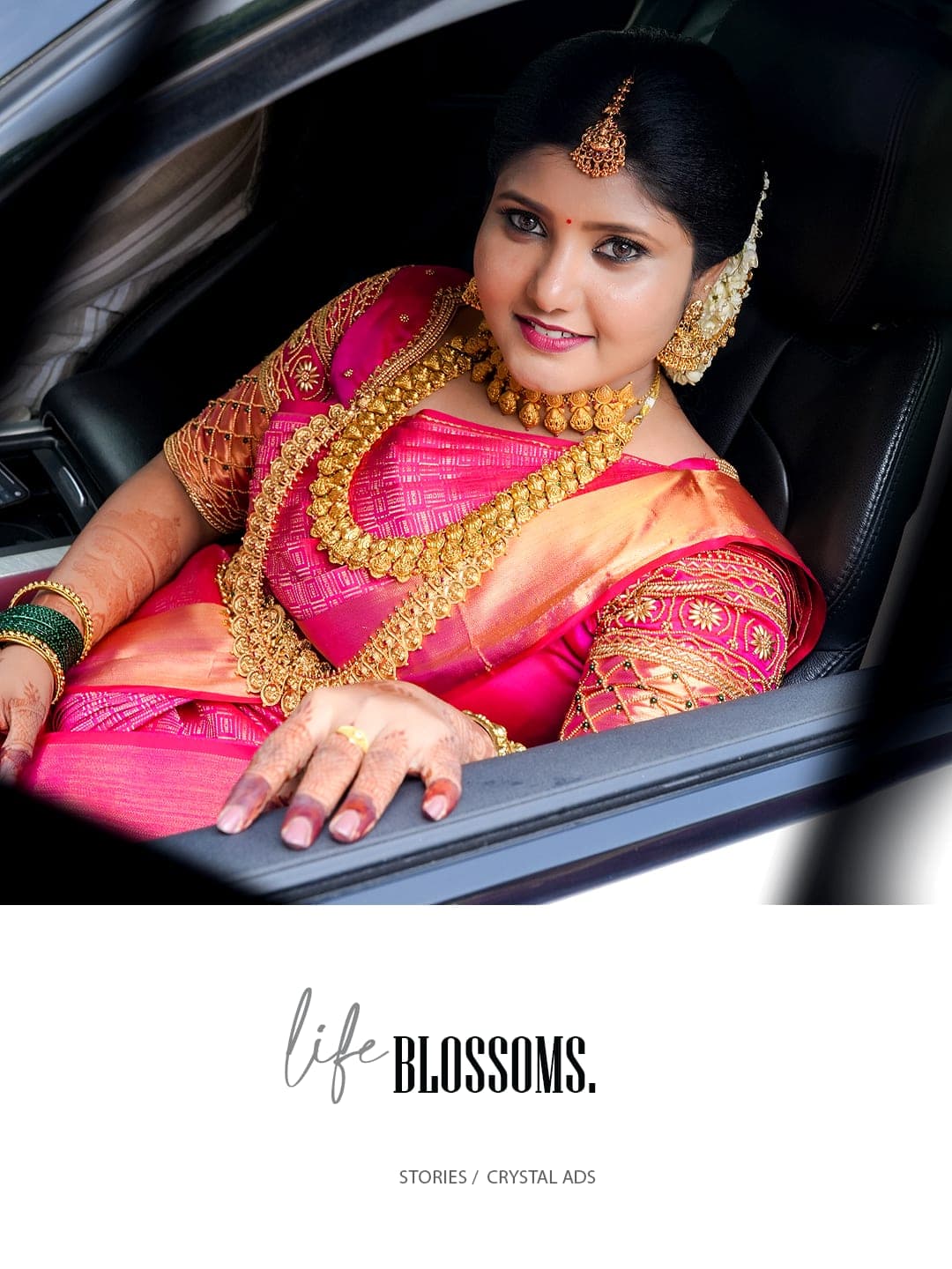 Bride smiling inside a car, dressed in traditional Kerala wedding attire