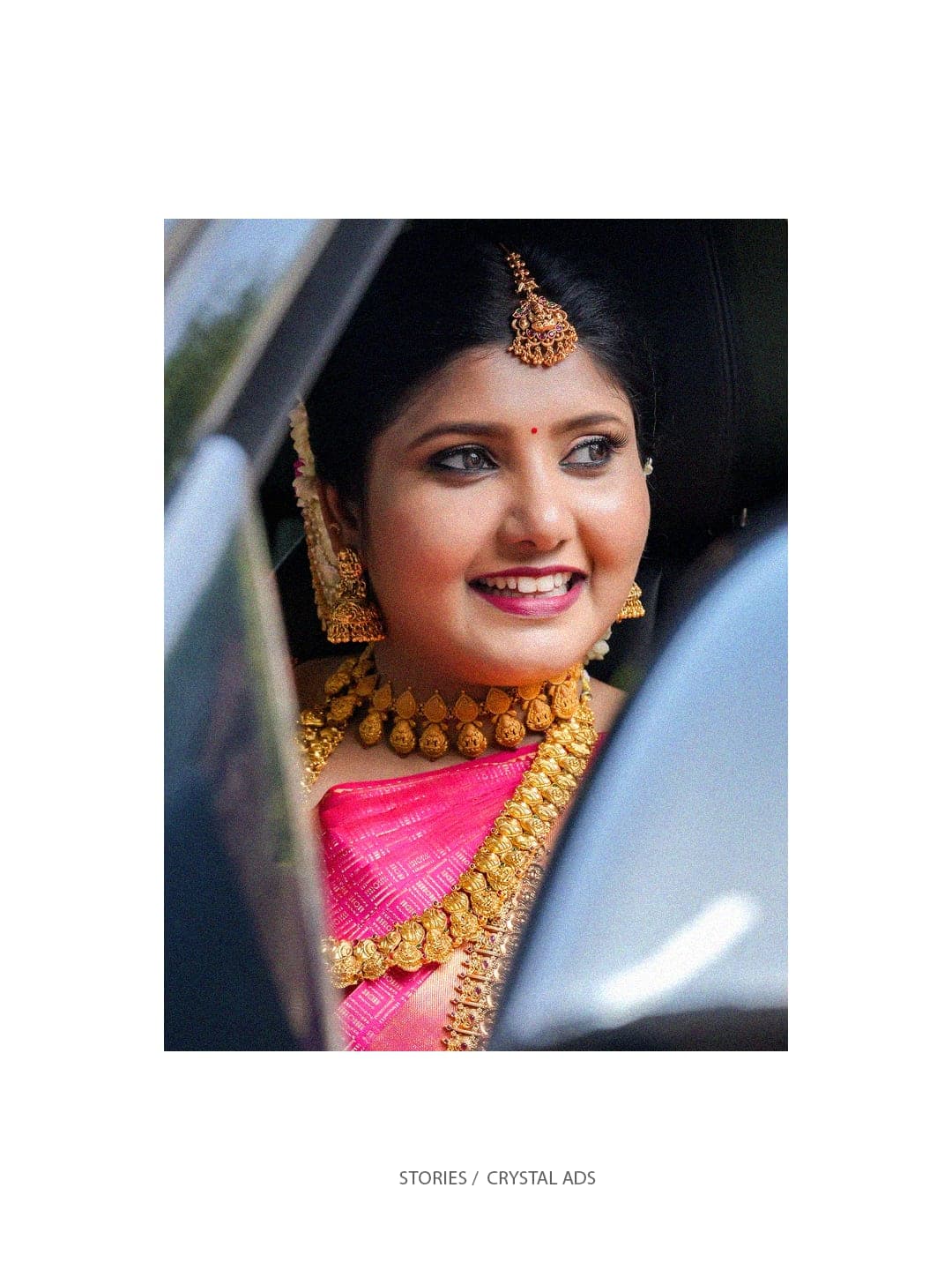 Bride glancing back through a car window